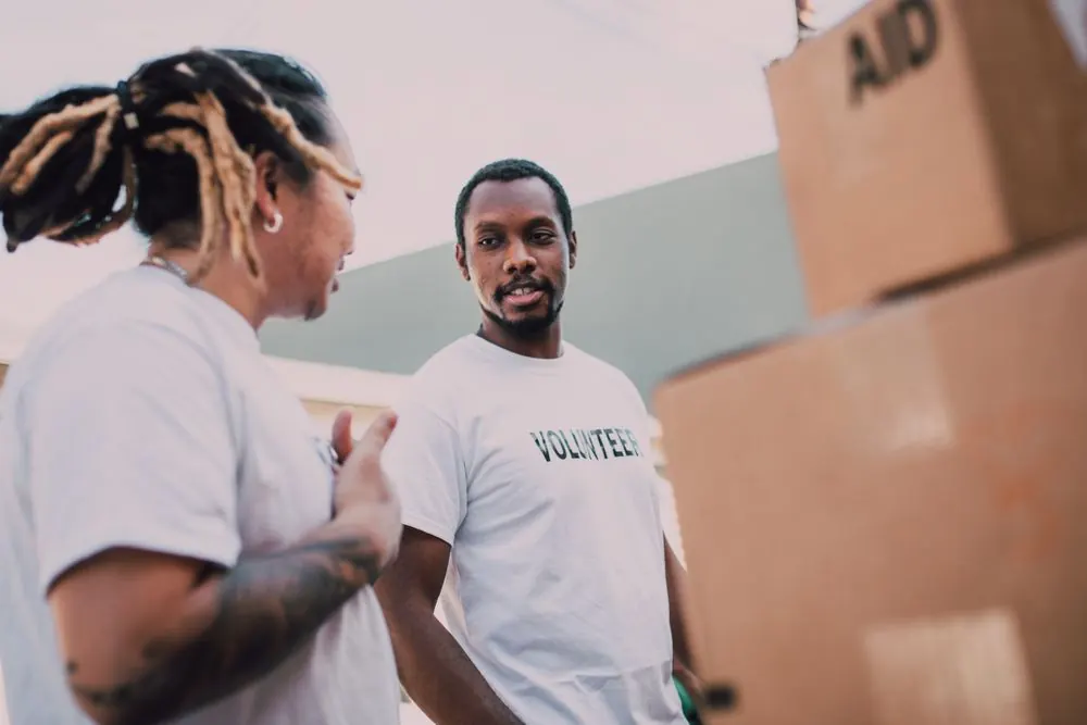 Volunteers organising aid packages together